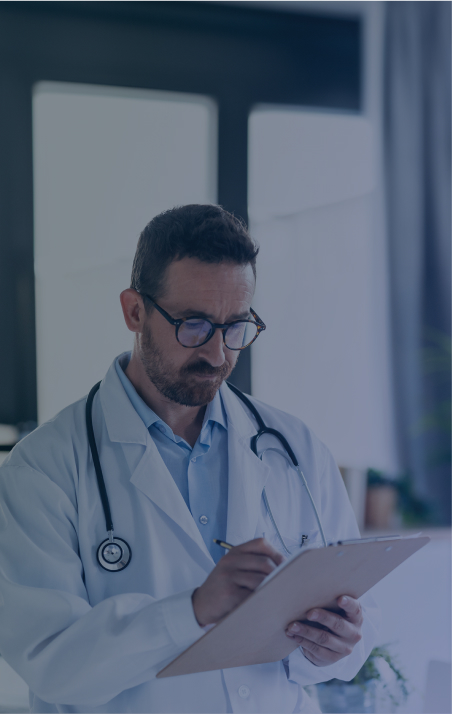 A provider is writing down his notes